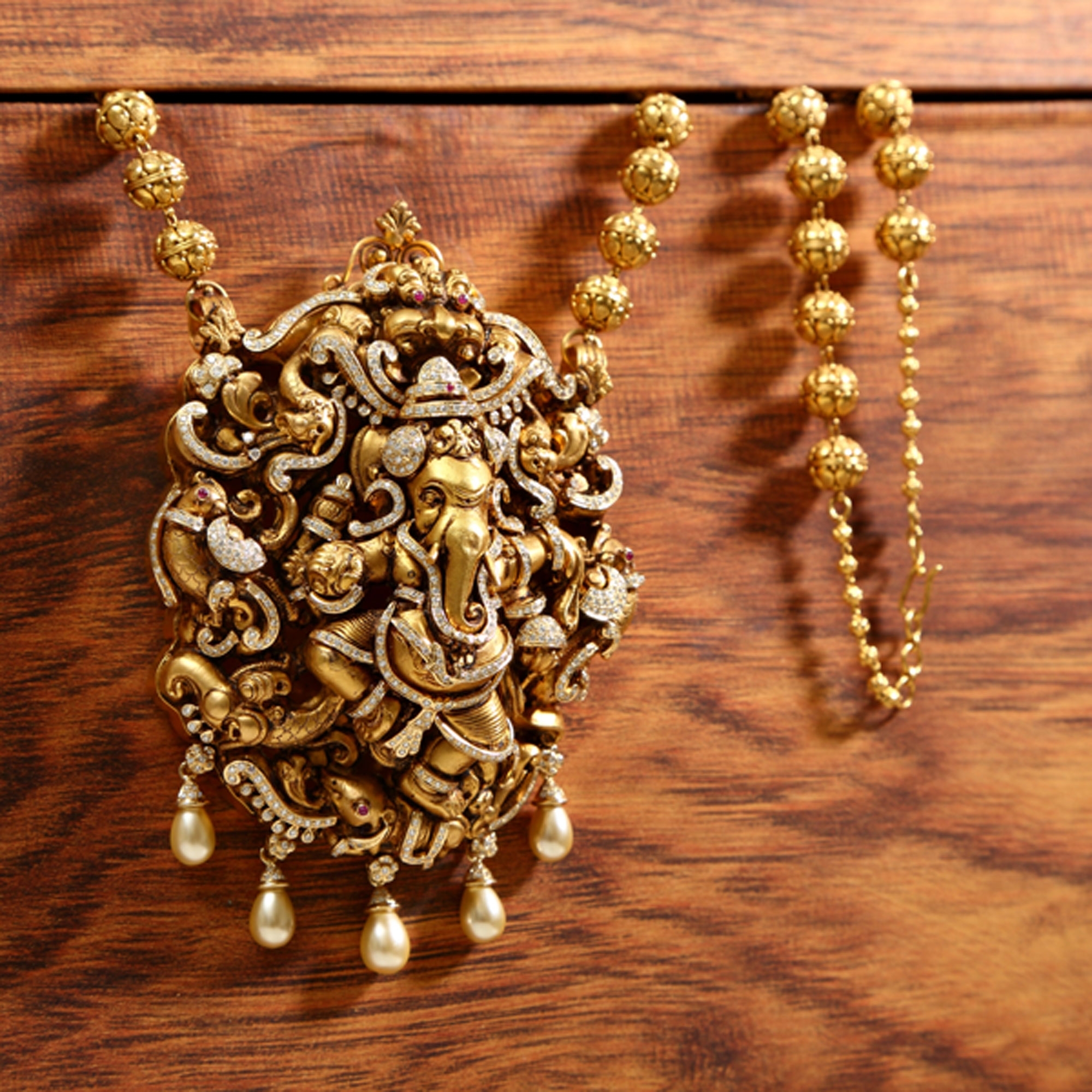 diamond ganesha pendant with nagas from vummidi